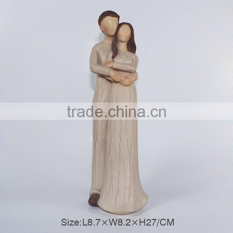 Wood imitation polyresin family figurine