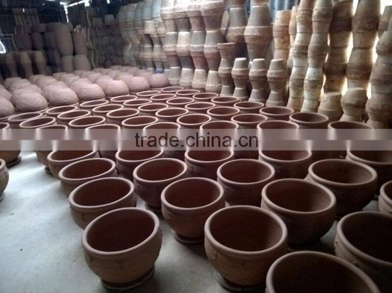 beautiful decoration orchid in pot, red terracotta pots