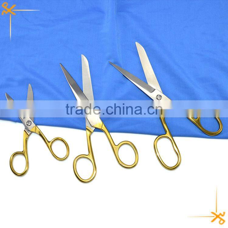 Full stainless steel scissors with gold-plating handle