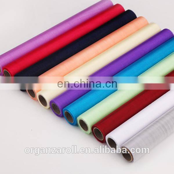 2015 hot sale customized cheap polyester crystal organza fabric roll