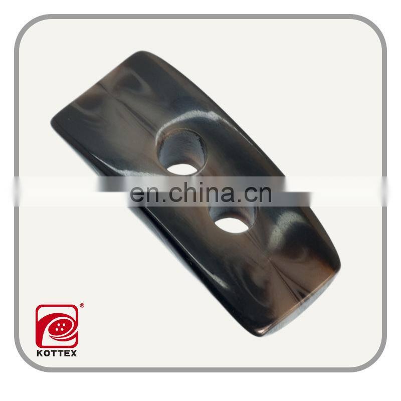 special shaped smooth surface resin imitation horn toggle buttons,2014 plastic toggle button,garment accessories