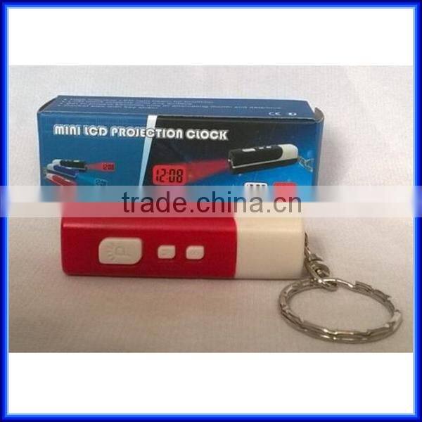 Novelty design easy carry portable mini digital lcd projector keychain clock