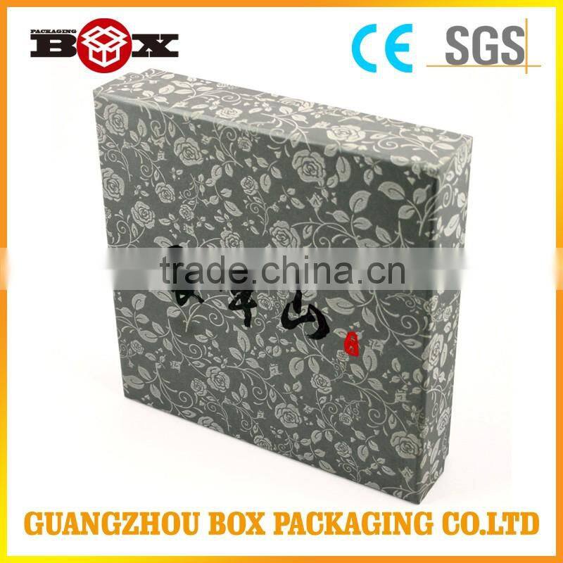 Plain black paper gift box with stamped logo