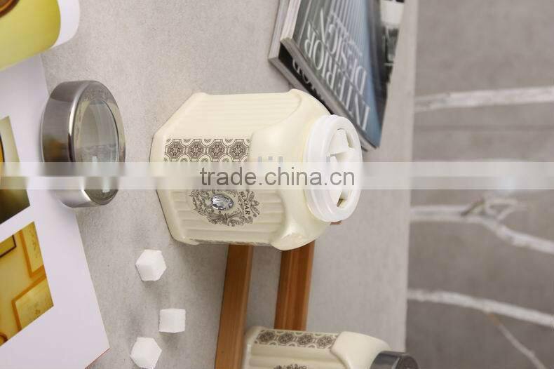 square ceramic canister set with bamboo stand