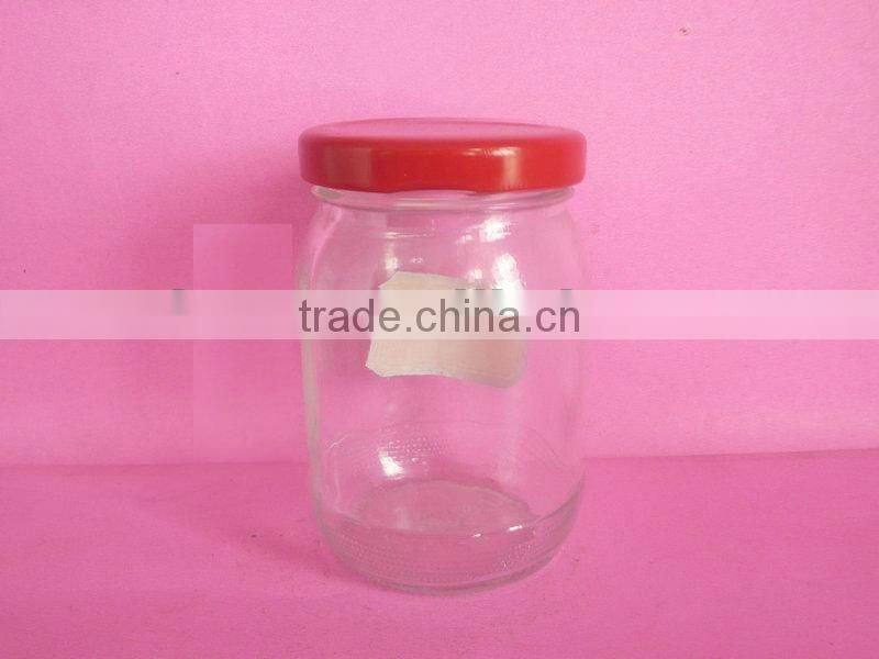 small glass container, glass pickle bottle