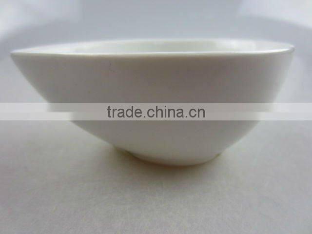 Stock white porcelain drop shaped sauce dish