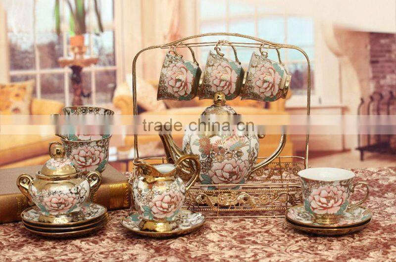 Hot sell electric golden porcelain tea Set teapot sugar bowl creamer cups and saucers Metal holder 15 Pcs 17pcs tea set