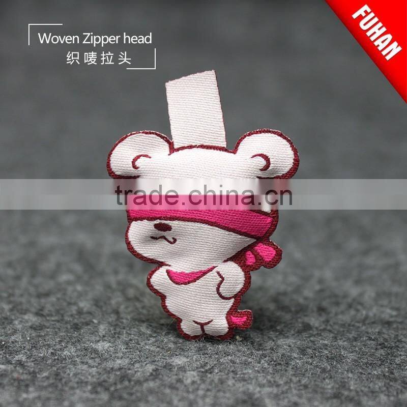 Double-sided woven zipper puller