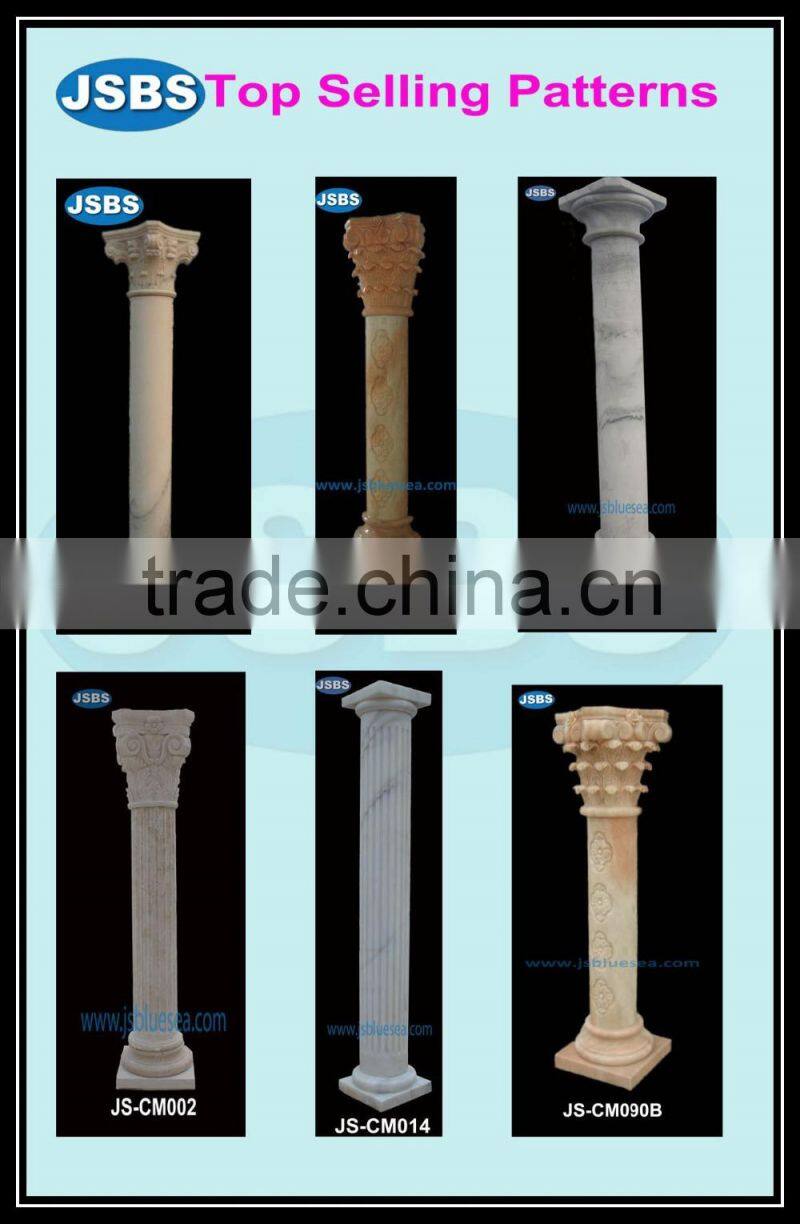 large decorative white stone column caps