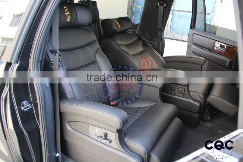 Lincoln Navigator pilot electric chair modification Lincoln navigator interior refitting middle seat electric
