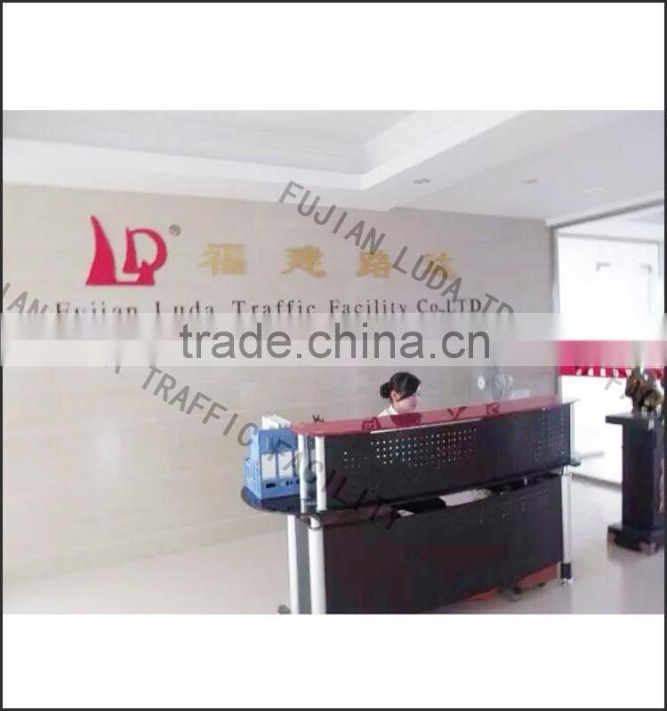 Colored wall corner protector for parking lot