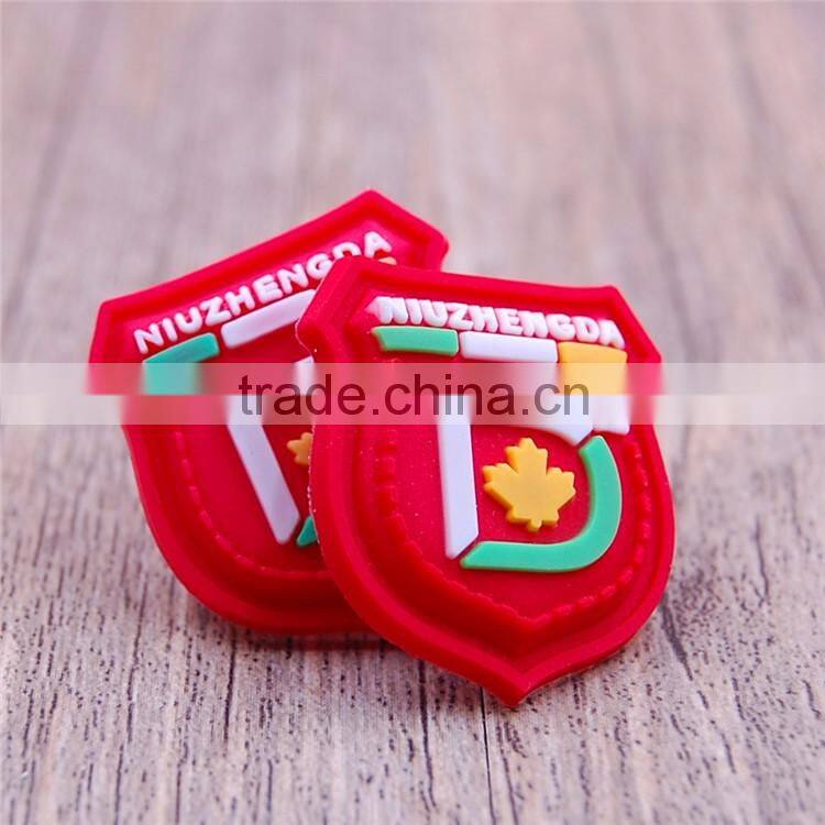 Private indonesia red shield shape pvc label for suitcase flannel shirt