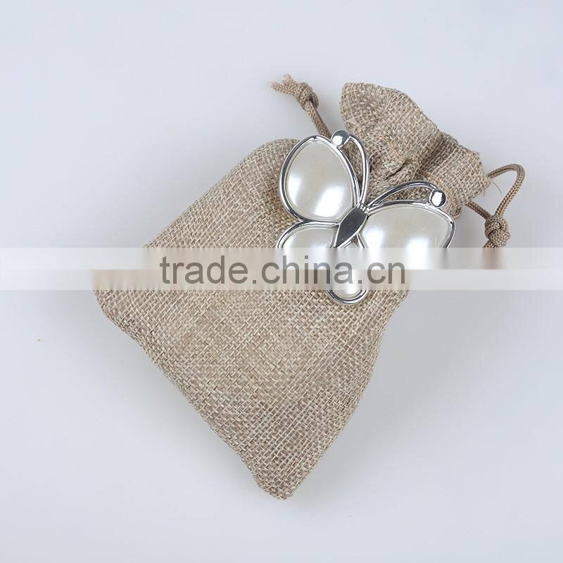 China wholesale white flower nice delicate butterfly shape brooches for sale