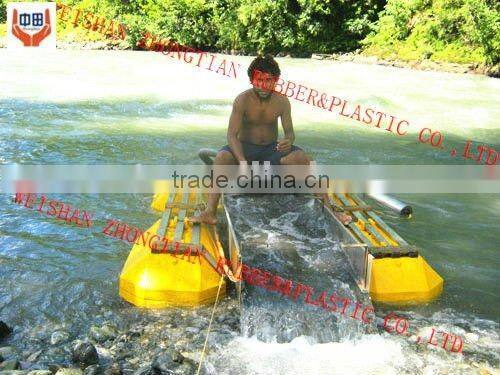 dredging small boat made by flaters and engine used for gold mining