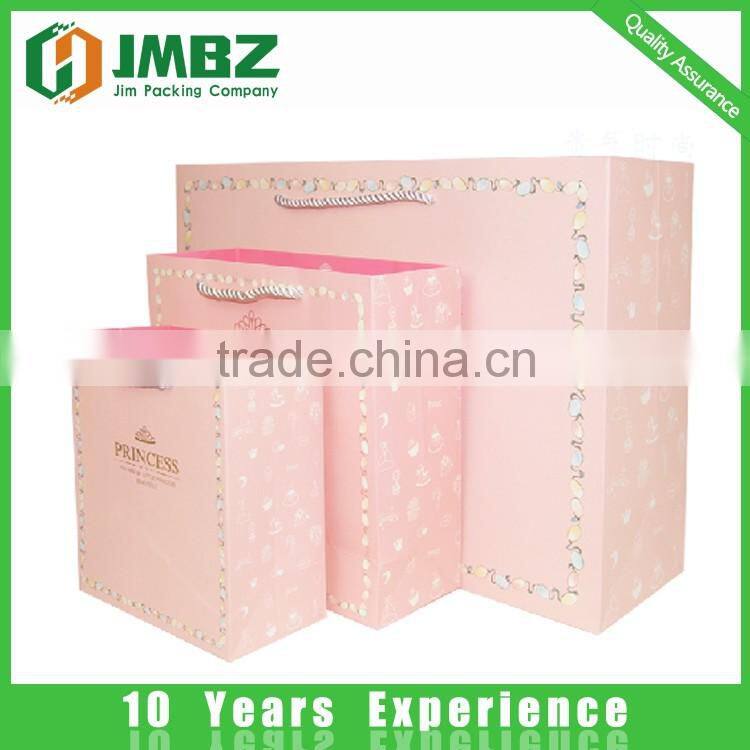 Custom made design and logo printed shopping paper bags with handles