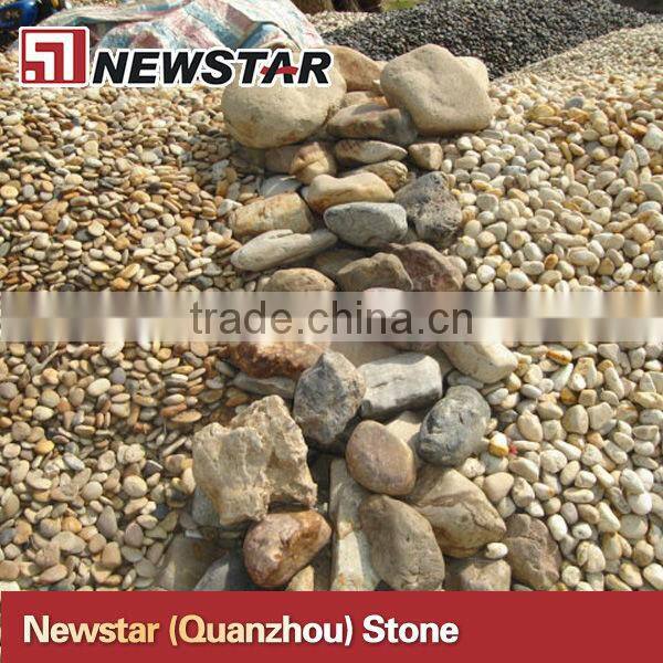 Washed large black pebbles