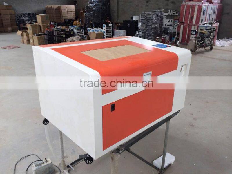 50W/60W optional LY CO2 laser wood engraving cutting machine 6040,Manual/Electric Table control mode,Can Applicable Industry