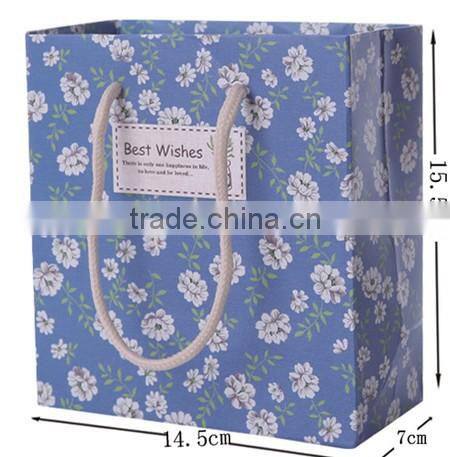 Latest OEM exquisite foldable paper gift box with handles for sale