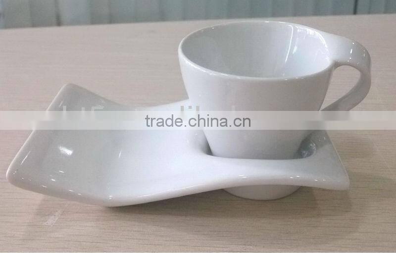 ceramic coffee mug with cookie holder and saucer