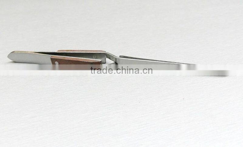 TWEEZERS CROSS LOCKING