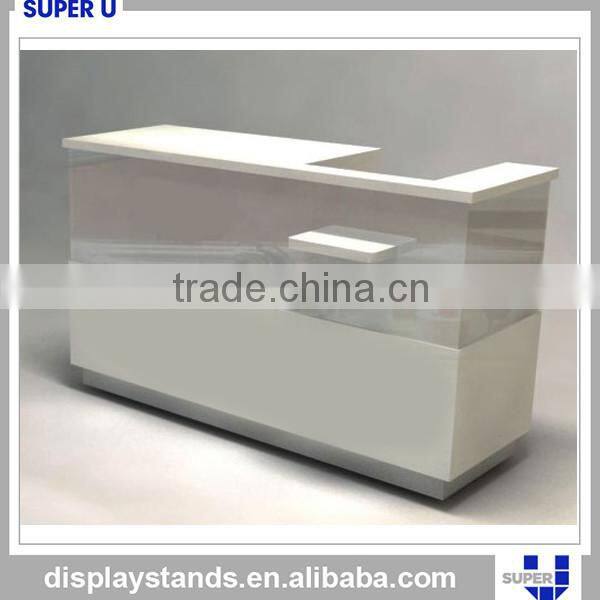 Unique design spray painted wooden cashiers table for a shop