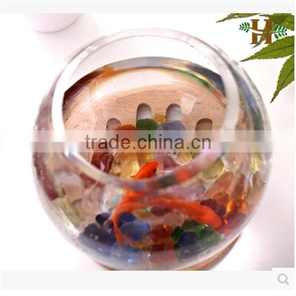 Handmade footed round shaped glass fish bowl