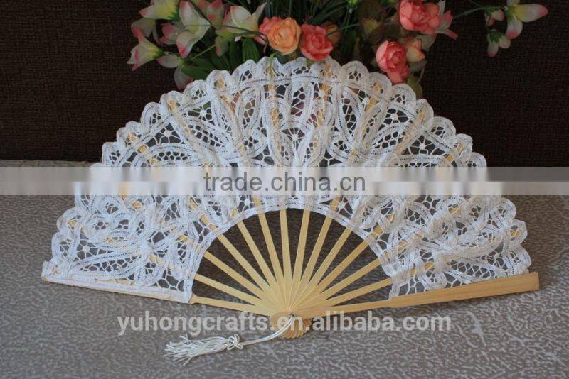Bridal held white lace fan