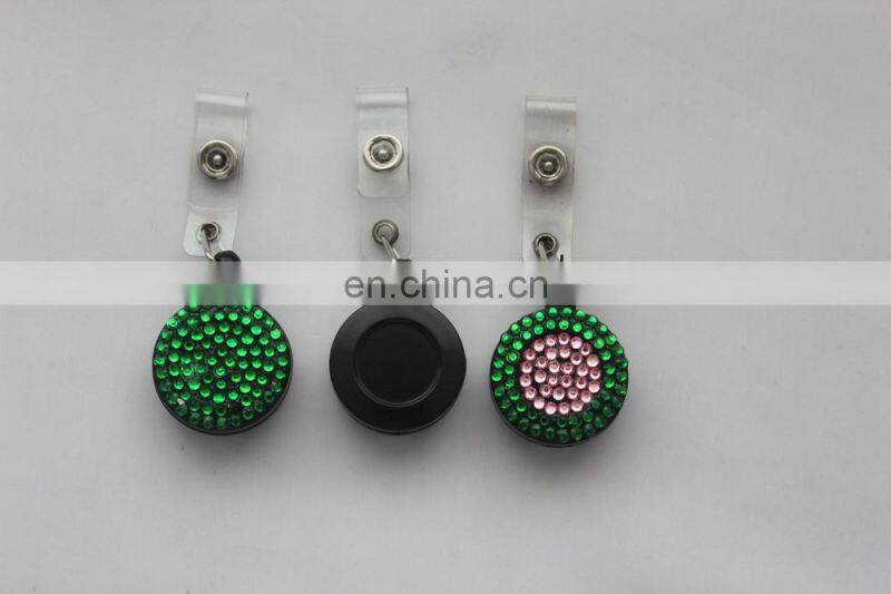 Round plastic logo attached badge with retractable string reels