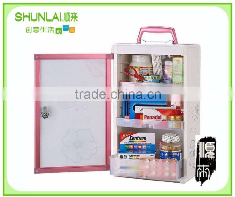 Plastic storage cabinet with drawer
