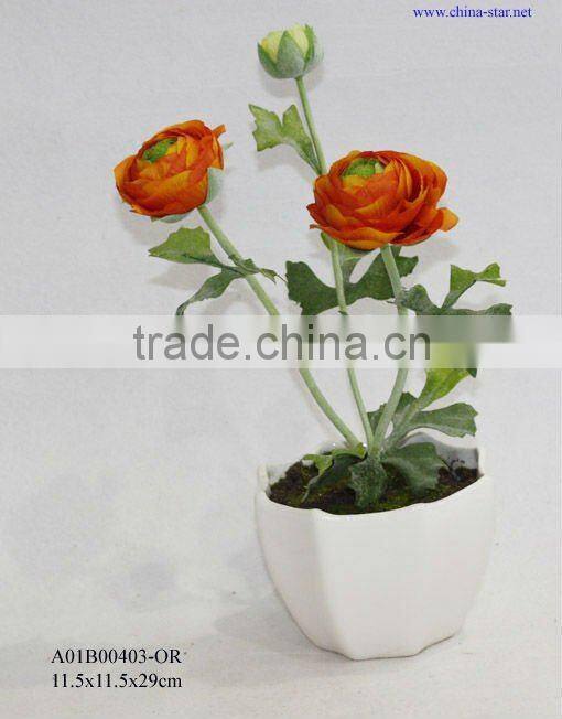 potted artificial red ranunculus