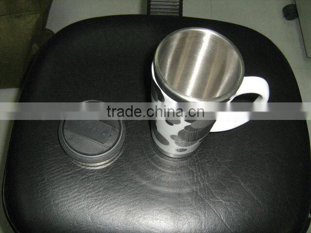 Double wall ceramic travel mug with stainless steel inner