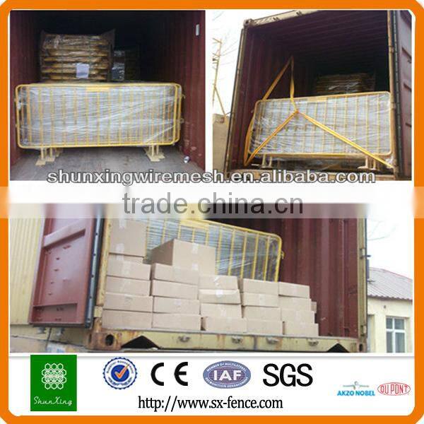 Yellow used road safety barrier, stage barrier