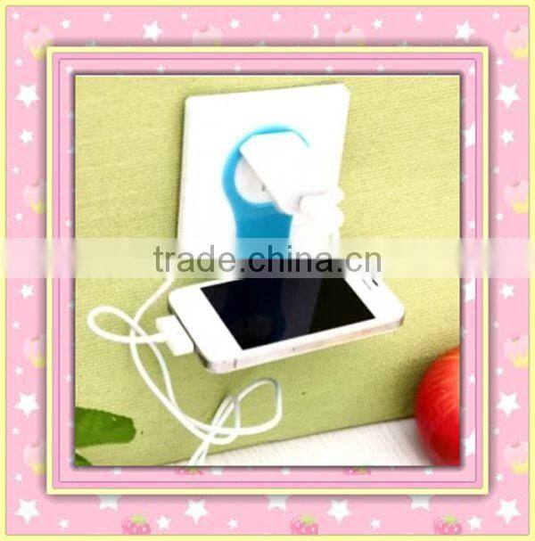 Silicone cell phone charger holder