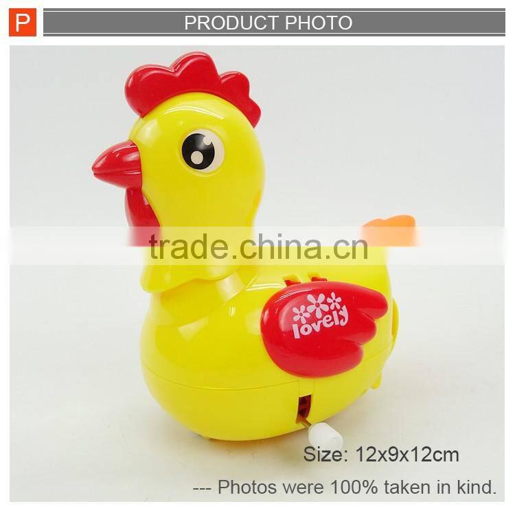 Funny wind up toy hen laying egg for kids
