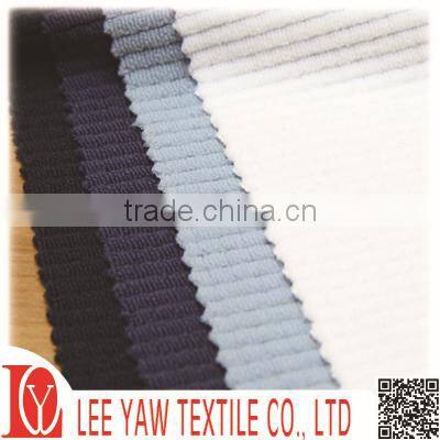 check terry fabric made of 94% polyester and 6% spandex with wicking treatment