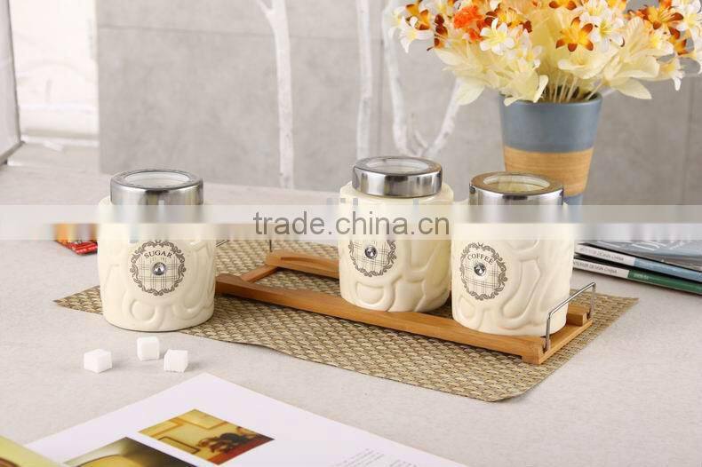 3pcs ceramic canister set with embossed design & bamboo stand