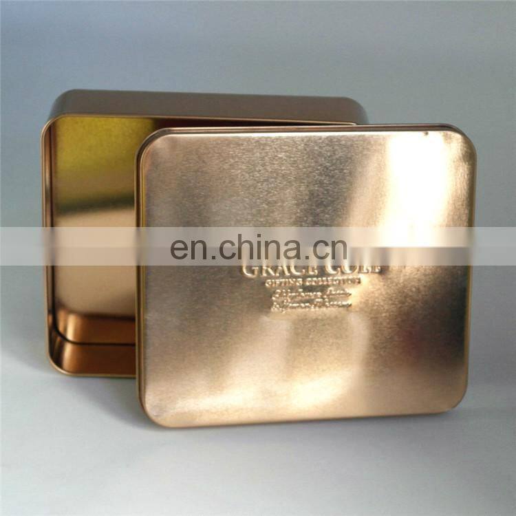 Gift tin box with purple color with ribbon hair bow