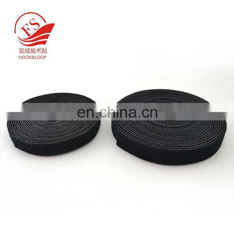 Back to back hook and loop magic tape strap