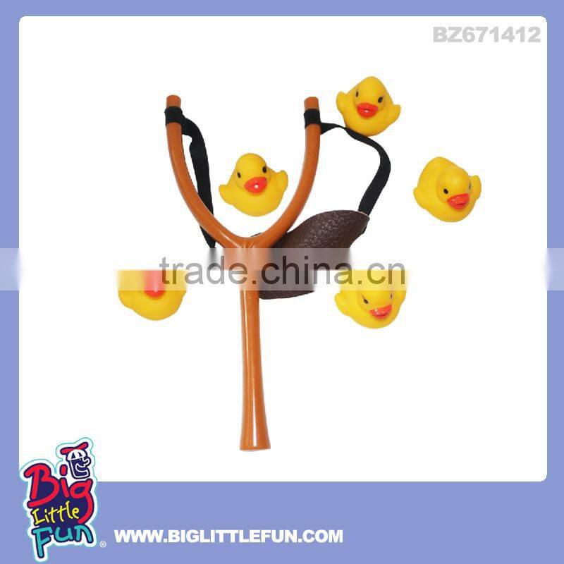 Plastic slingshot toy pig