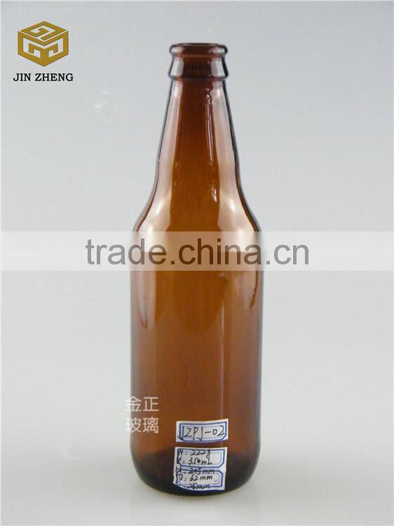 330ml dark amber open beer bottle with fridge magnet