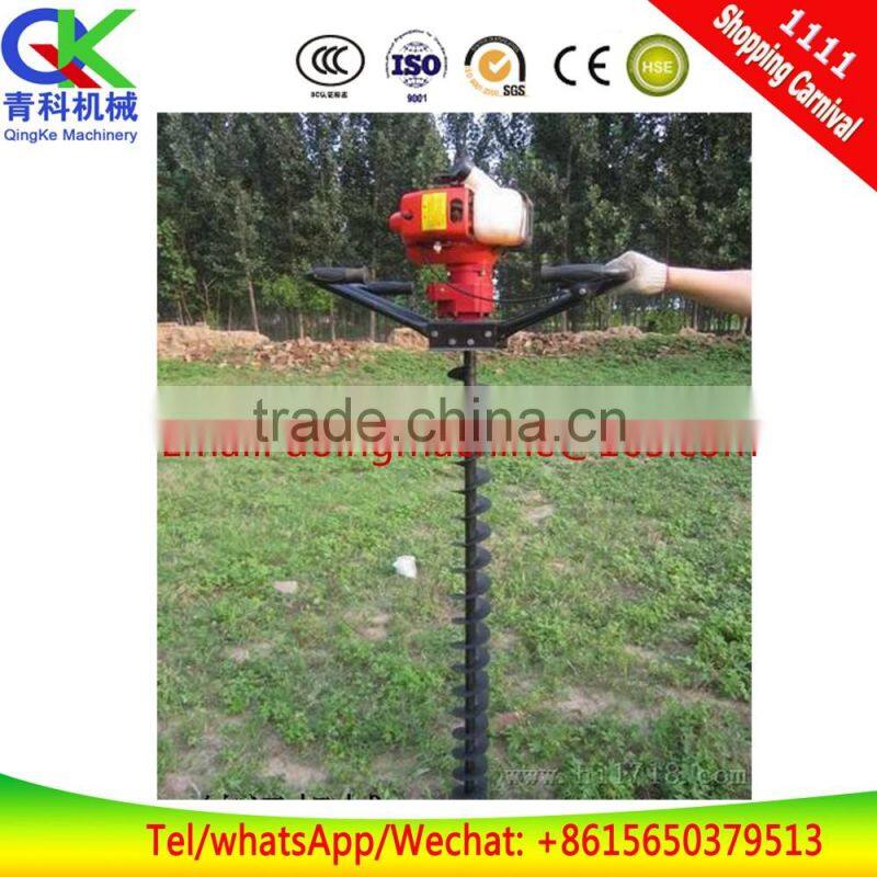Orchard earth auger with Honda petrol engine