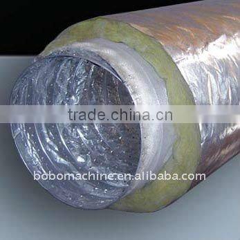Flexible duct making machine with fiberglass reinforced scrim film