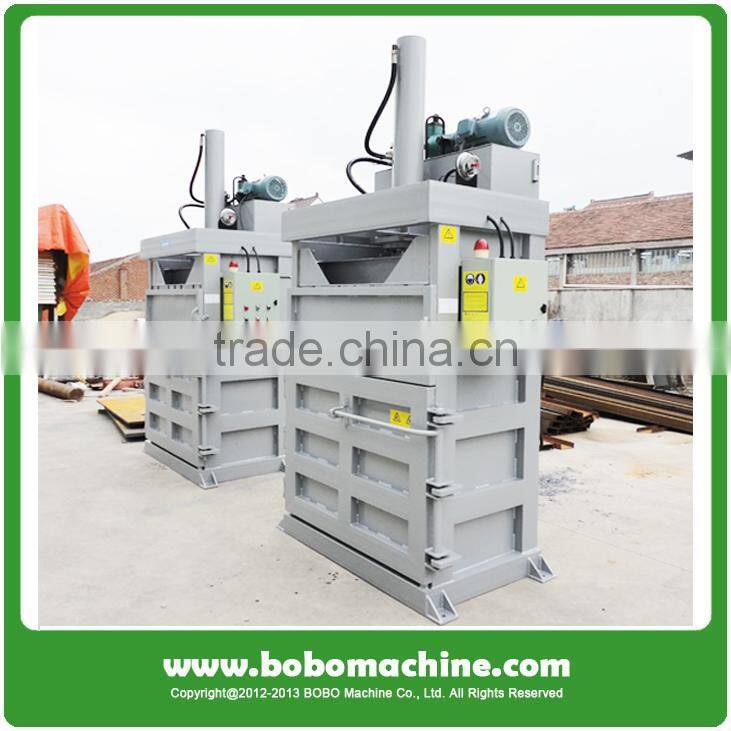 Electronic button control scrap cardboard baler