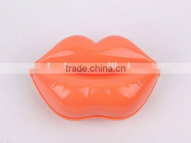 Lip shaped plastic massage comb with mirror/hair brush