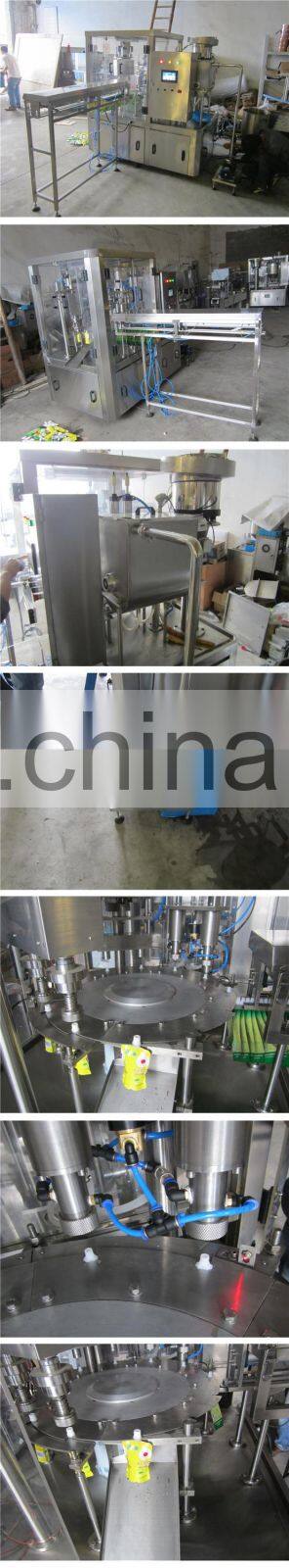 Full auto spout pouch filling capping machine/synthetic bags