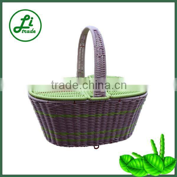 green plastic storage basket with handle
