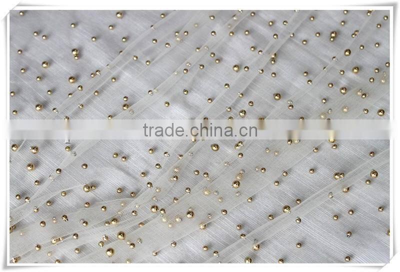 New arrival Transparent tulle soft beige net fabric with gold beads for Girl's dress