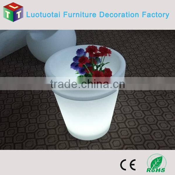 China manufacturer electric rotating flower pot with led lights for outdoor