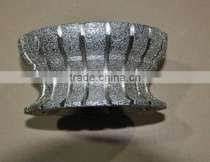 Vacuum brazed diamond cutting and grinding tools for large granite/large diamond granite router bits