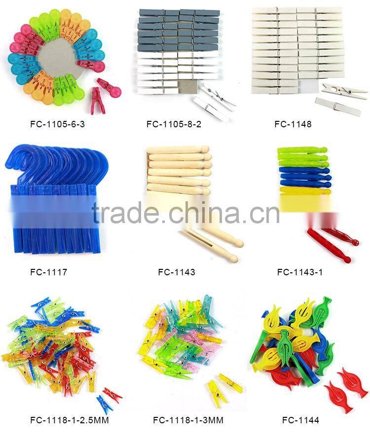 colored big plastic clothes pegs
